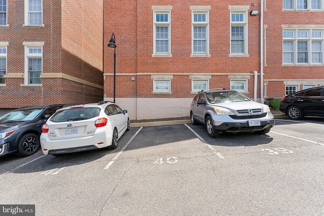 view of property with uncovered parking