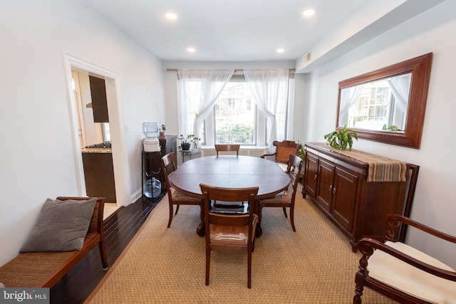dining space with recessed lighting