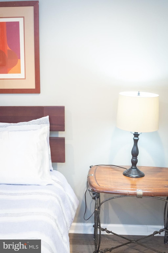 bedroom featuring baseboards