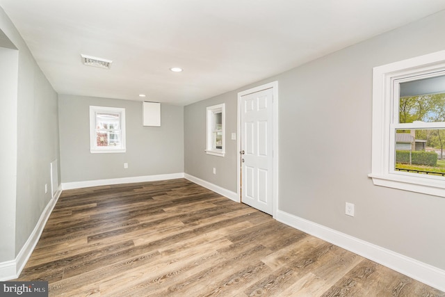 5300 Bino Rd, Greencastle, PA 17225 - unfurnished room featuring plenty of natural light, visible vents, baseboards, and wood finished floors
