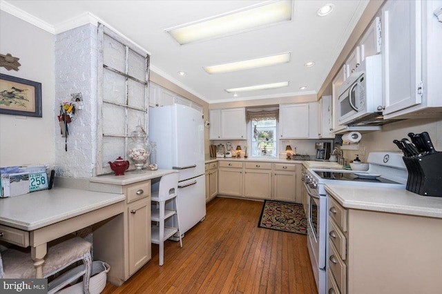 15539 Liberty Rd, Mount Airy, MD 21771 - kitchen with a sink, wood-type flooring, white appliances, crown molding, and light countertops