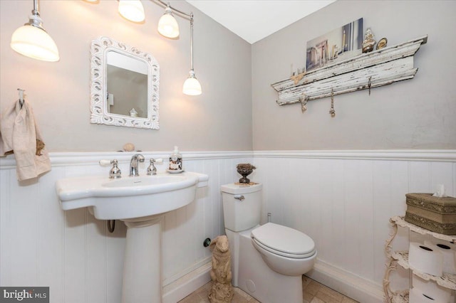 15539 Liberty Rd, Mount Airy, MD 21771 - half bath featuring toilet and a wainscoted wall