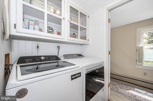 15539 Liberty Rd, Mount Airy, MD 21771 - laundry area featuring cabinet space, a baseboard heating unit, and washing machine and dryer
