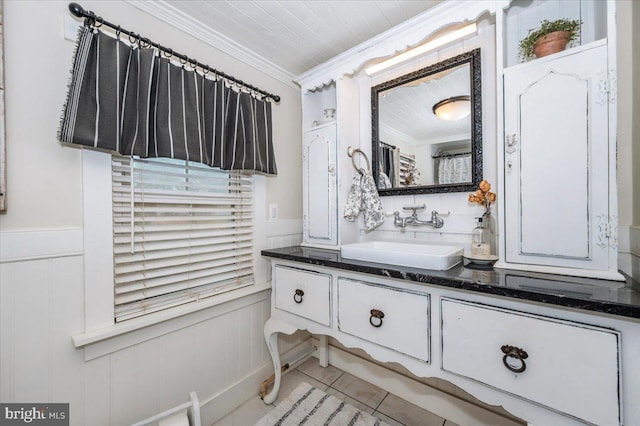15539 Liberty Rd, Mount Airy, MD 21771 - bathroom featuring a decorative wall, vanity, crown molding, and a wainscoted wall