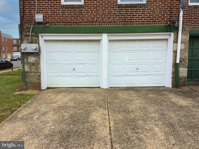 garage featuring driveway