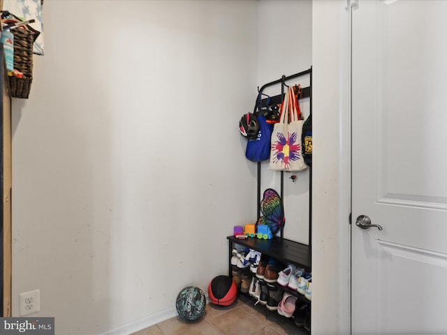 mudroom with tile patterned floors