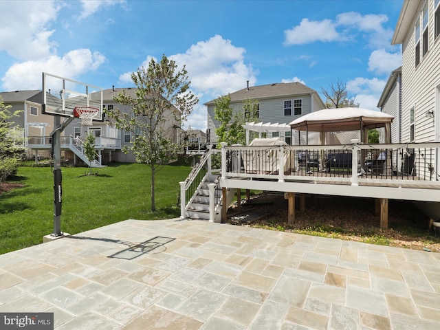 exterior space featuring a gazebo, a deck, and stairway