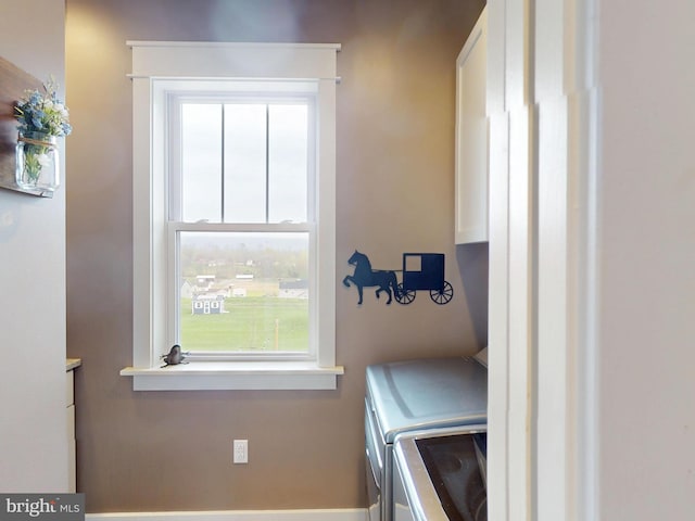 219 Pepper Ridge Dr, Spring Mills, PA 16875 - laundry area featuring washer and dryer, a healthy amount of sunlight, and laundry area
