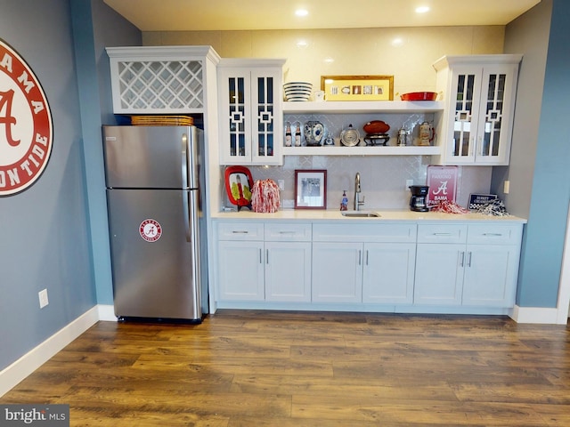 219 Pepper Ridge Dr, Spring Mills, PA 16875 - kitchen featuring decorative backsplash, freestanding refrigerator, open shelves, a sink, and white cabinetry