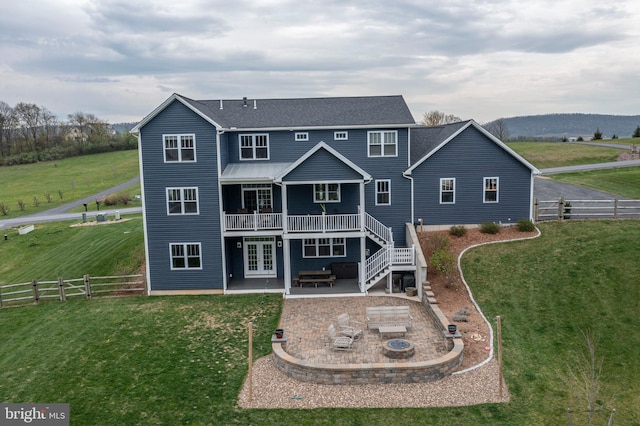 219 Pepper Ridge Dr, Spring Mills, PA 16875 - back of house featuring a yard, a fire pit, french doors, and a patio area