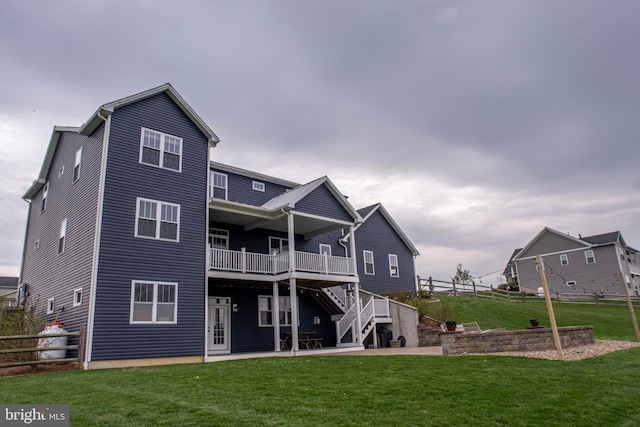 219 Pepper Ridge Dr, Spring Mills, PA 16875 - back of house with fence, stairs, a deck, a patio area, and a lawn