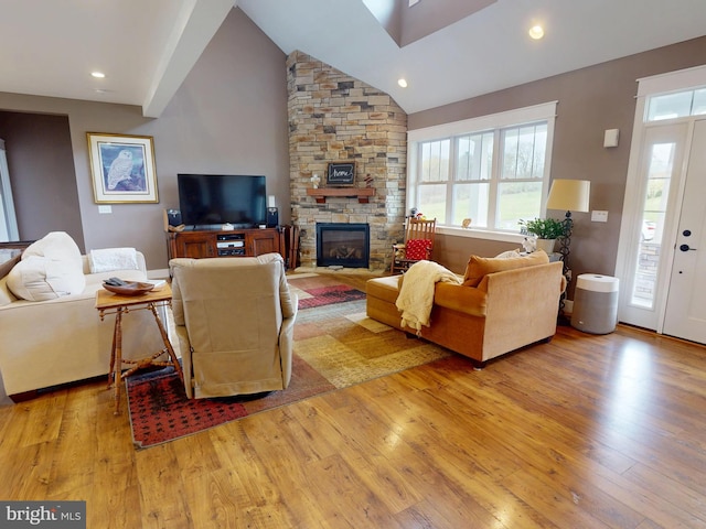 219 Pepper Ridge Dr, Spring Mills, PA 16875 - living room with a fireplace, high vaulted ceiling, light wood-style flooring, and recessed lighting
