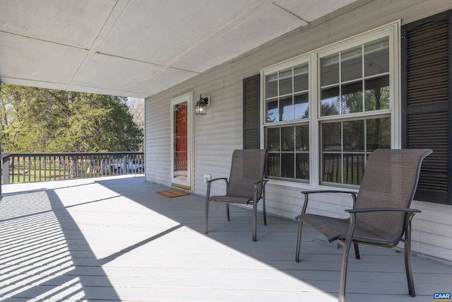 wooden terrace with covered porch