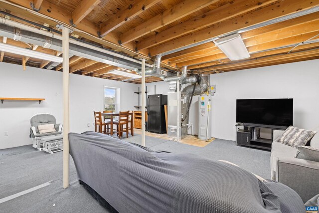 carpeted living area featuring heating unit and water heater