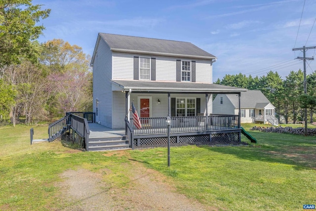 view of front facade featuring a front lawn and covered porch