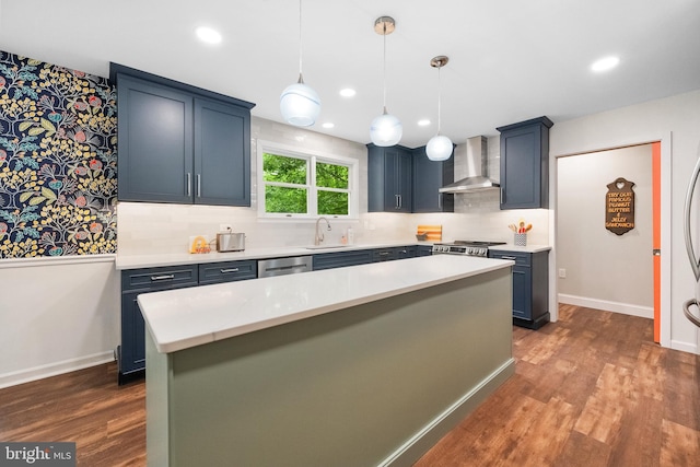 33 Fern Ct, Front Royal, VA 22630 - kitchen with wall chimney range hood, dark wood finished floors, light countertops, a sink, and backsplash