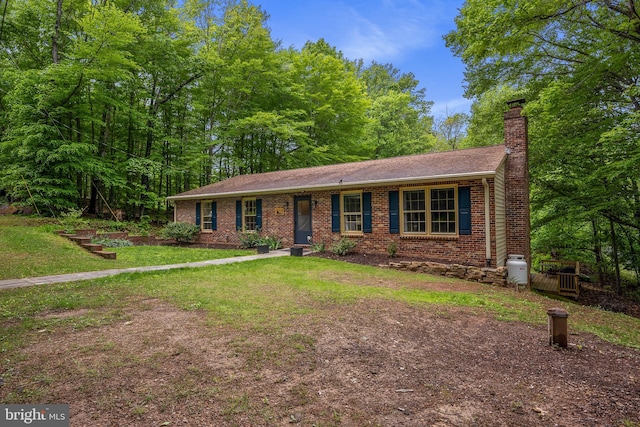 33 Fern Ct, Front Royal, VA 22630 - single story home with brick siding, a chimney, a front lawn, and roof with shingles