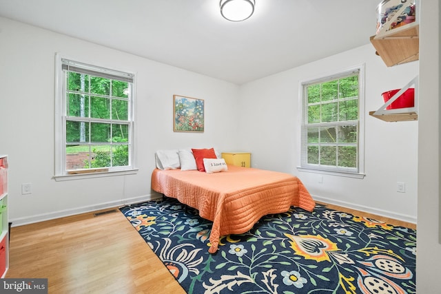 33 Fern Ct, Front Royal, VA 22630 - bedroom featuring wood finished floors and baseboards