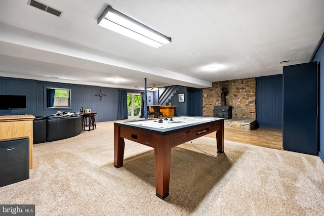 33 Fern Ct, Front Royal, VA 22630 - recreation room with a wood stove and carpet floors