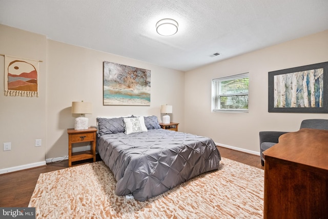 33 Fern Ct, Front Royal, VA 22630 - bedroom featuring wood finished floors, baseboards, and a textured ceiling