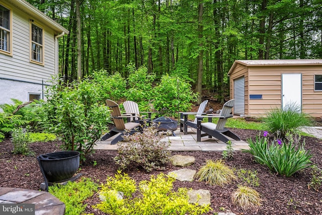 33 Fern Ct, Front Royal, VA 22630 - view of yard with an outdoor fire pit, an outdoor structure, and a patio area