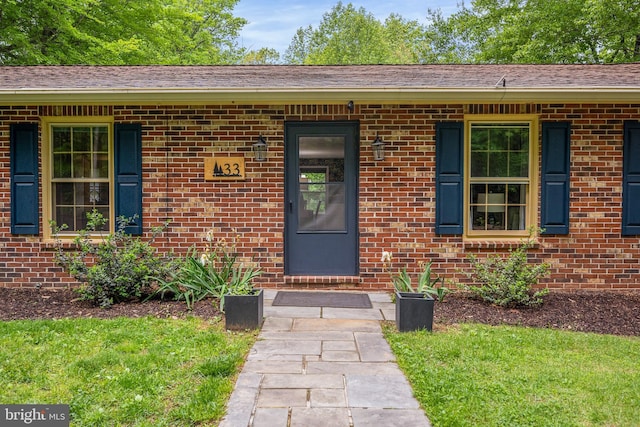 33 Fern Ct, Front Royal, VA 22630 - doorway to property with brick siding and a lawn