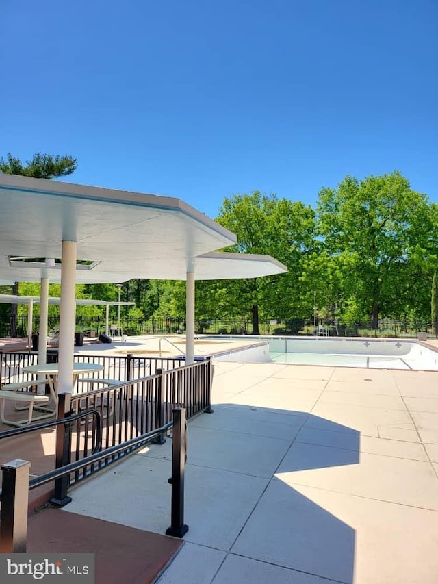 6631 Wakefield Dr Unit 804, Alexandria, VA 22307 - view of patio featuring a community pool