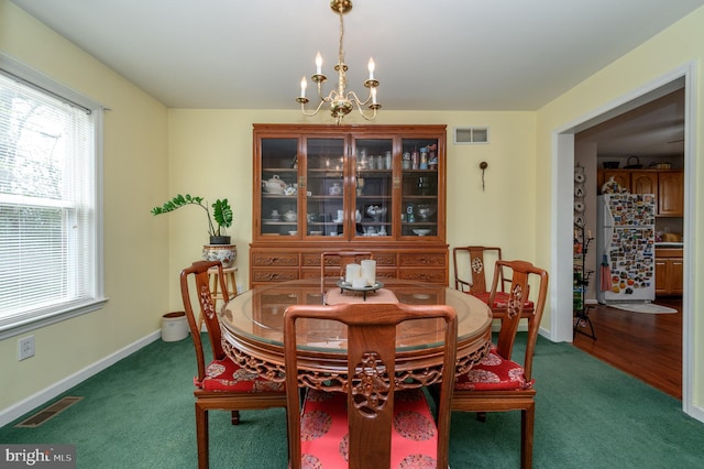 206 Iriquois, Browns Mills, NJ 08015 - dining room featuring a wealth of natural light, a chandelier, and visible vents