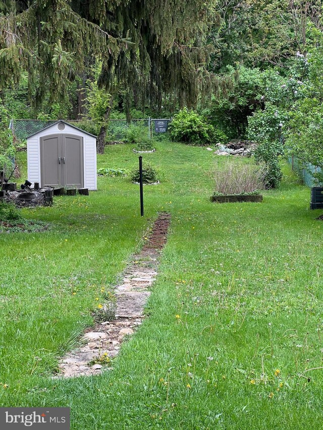 451 Main St, Ashland, PA 17921 - view of green lawn with a shed and an outbuilding