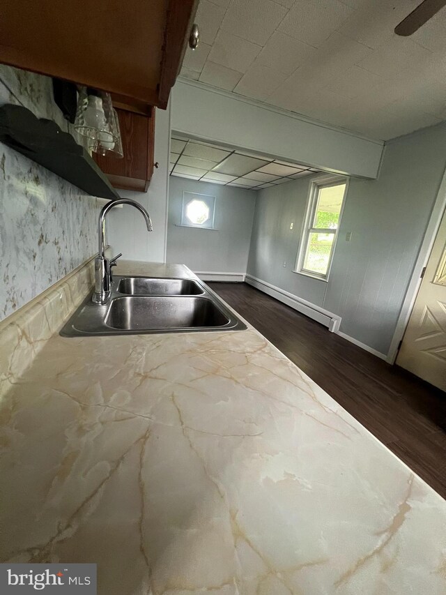 451 Main St, Ashland, PA 17921 - kitchen with a sink, dark wood-style flooring, baseboard heating, and light countertops