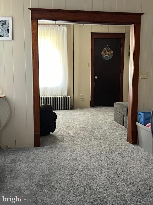 451 Main St, Ashland, PA 17921 - carpeted living room featuring radiator
