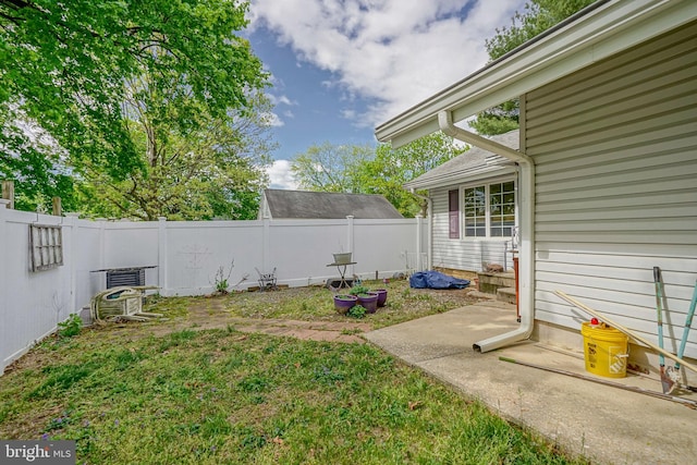 view of yard with a fenced backyard
