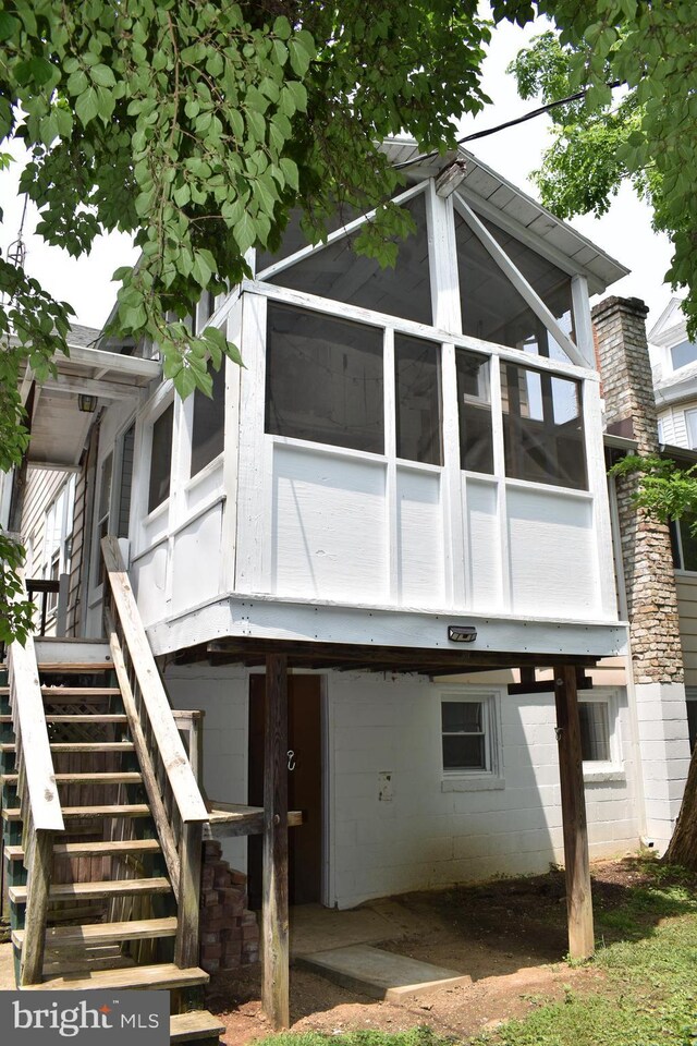 854 View St, Hagerstown, MD 21742 - rear view of house with stairway and a sunroom
