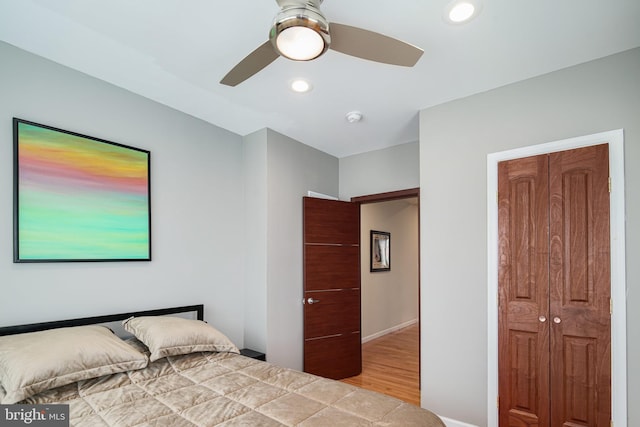 bedroom with recessed lighting, baseboards, ceiling fan, and wood finished floors