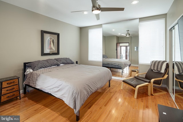 bedroom featuring recessed lighting, baseboards, ceiling fan, and light wood-type flooring