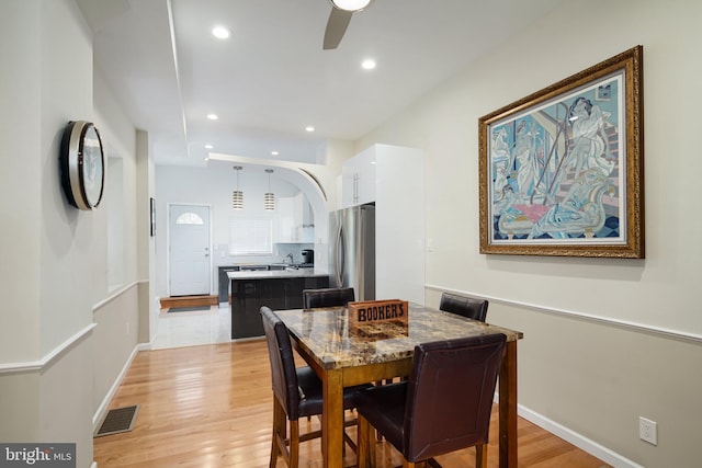 dining area with visible vents, baseboards, ceiling fan, light wood-type flooring, and recessed lighting