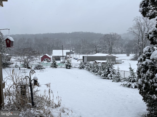 11416 Kline Dr NW, Cumberland, MD 21502 - yard covered in snow with a view of trees