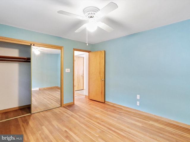 11416 Kline Dr NW, Cumberland, MD 21502 - unfurnished bedroom featuring wood finished floors, a closet, baseboards, and ceiling fan