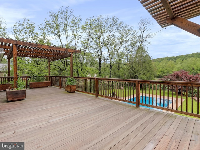 11416 Kline Dr NW, Cumberland, MD 21502 - wooden terrace featuring a pergola, an outdoor pool, and a wooded view