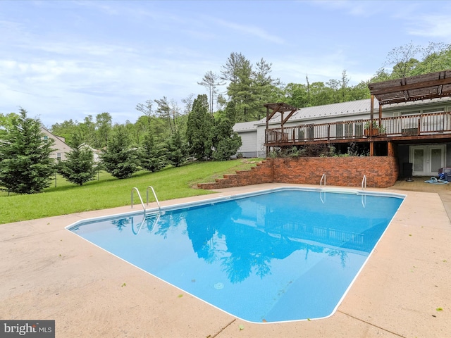 11416 Kline Dr NW, Cumberland, MD 21502 - swimming pool with a wooden deck, a lawn, and french doors