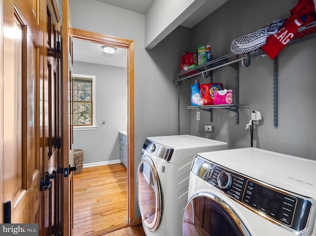 137 E Holly, Haddon Township, NJ 08107 - laundry area featuring separate washer and dryer, light wood-style floors, and baseboards