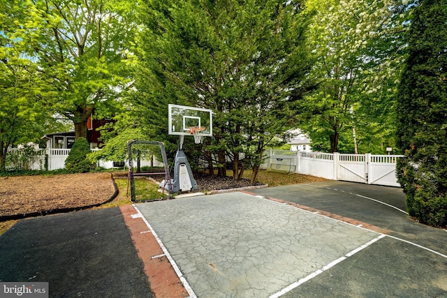 137 E Holly, Haddon Township, NJ 08107 - view of basketball court featuring a gate and basketball hoop