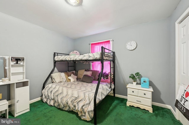 carpeted bedroom with baseboards