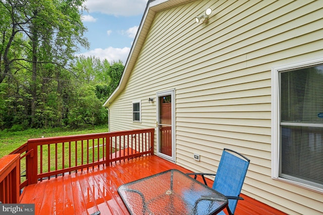 deck featuring outdoor dining area