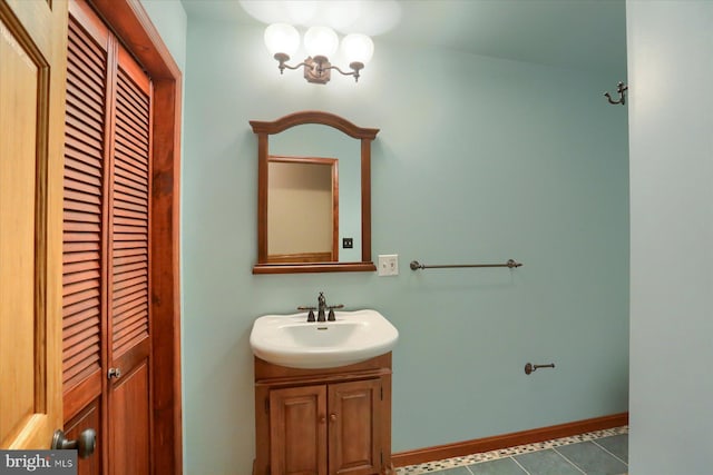 7395 Jonestown Rd, Harrisburg, PA 17112 - bathroom featuring baseboards, tile patterned flooring, and vanity