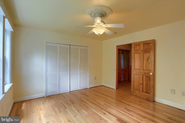 7395 Jonestown Rd, Harrisburg, PA 17112 - unfurnished bedroom with baseboards, a closet, and light wood-type flooring