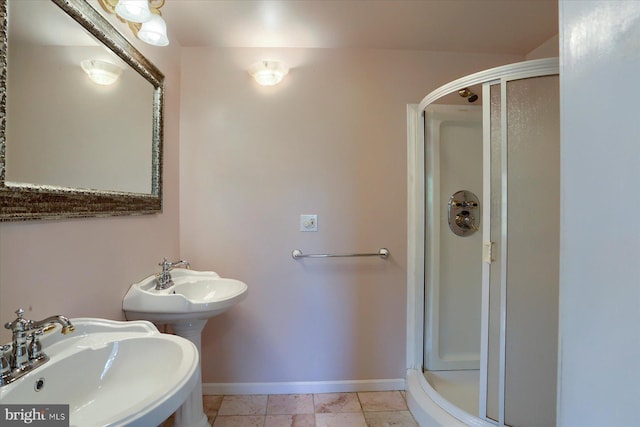 7395 Jonestown Rd, Harrisburg, PA 17112 - bathroom with baseboards, a shower stall, and a sink
