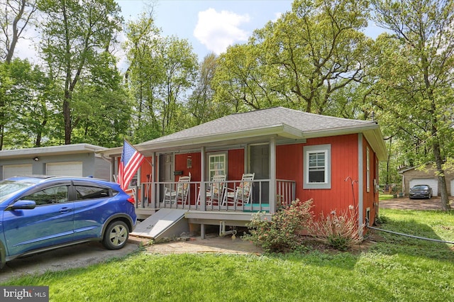 7395 Jonestown Rd, Harrisburg, PA 17112 - view of front of home with a porch, roof with shingles, and a front yard