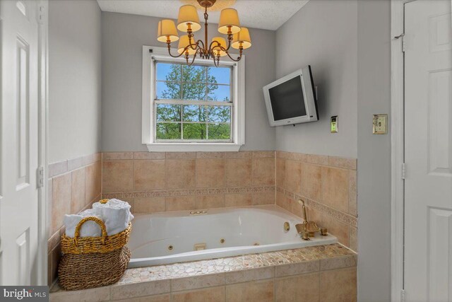 12401 Trotter Ter, Upper Marlboro, MD 20774 - full bathroom featuring a chandelier and a whirlpool tub