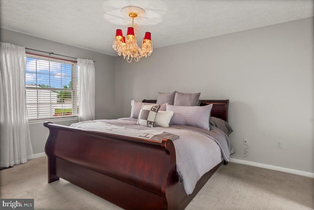 12401 Trotter Ter, Upper Marlboro, MD 20774 - bedroom with light carpet, a chandelier, and baseboards